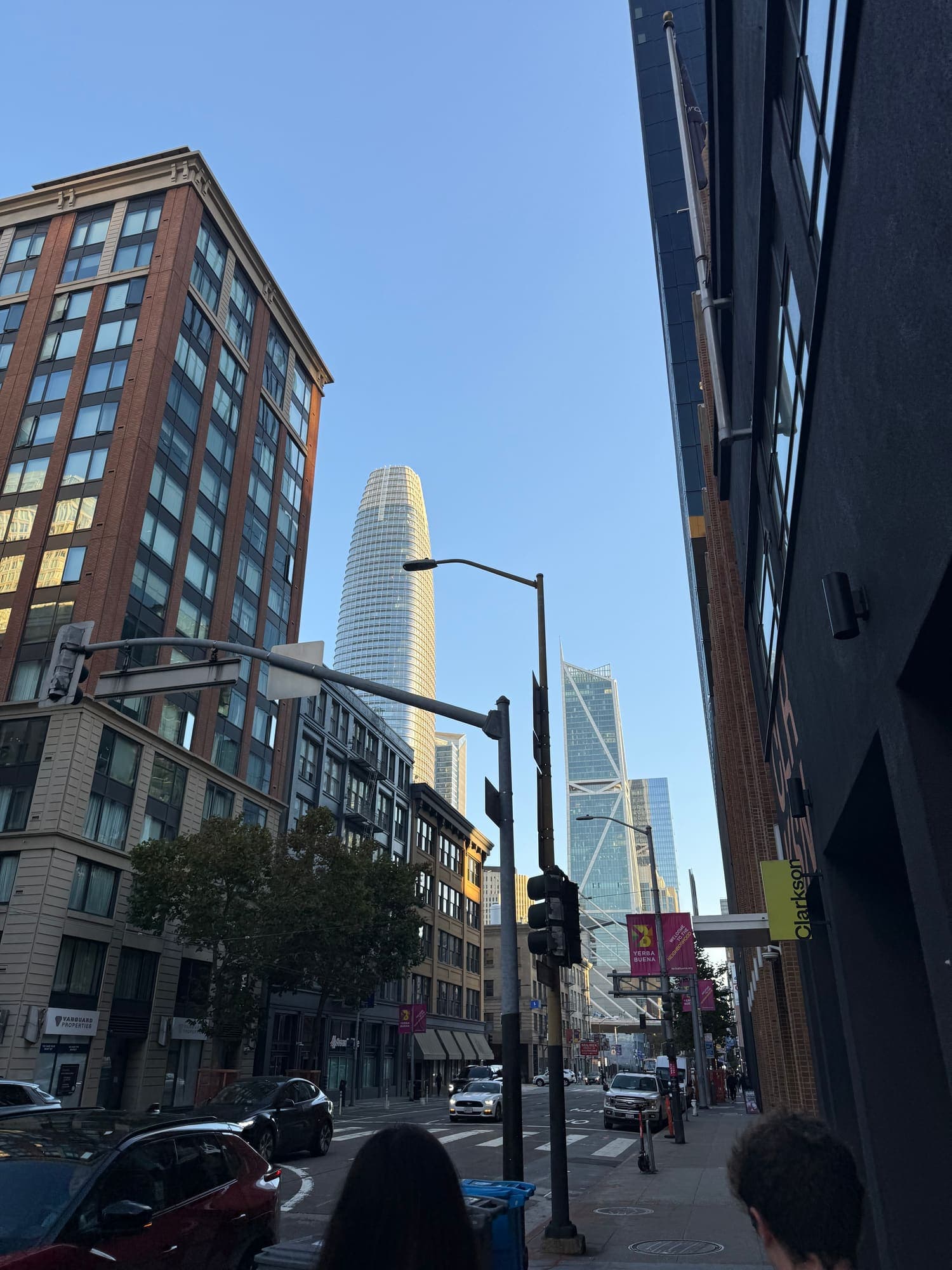 Builders members on a San Francisco street, looking up at Salesforce Tower